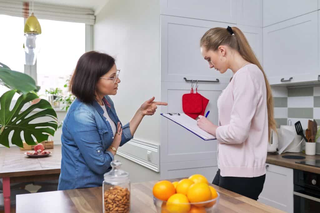 A representative of the removals company conducting a pre-move survey